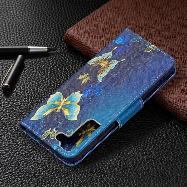 Wonderland Samsung Galaxy S22 Plus Flip Etui - Gyldne Sommerfugle Multicolor