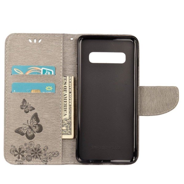 Samsung Galaxy S10 sommerfugle- og blomstertryk læder flip etui - Grå Silver grey