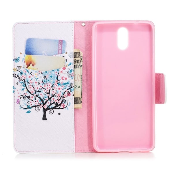 Wonderland Nokia 3.1 flip veske - Blomstrende tre Multicolor