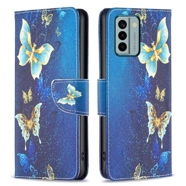 Wonderland Nokia G22 Flip Etui - Gyldne Sommerfugle Blue