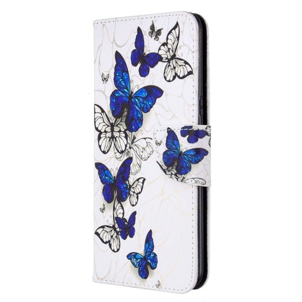 Wonderland LG K61 Etui - Blå og hvide sommerfugle Multicolor