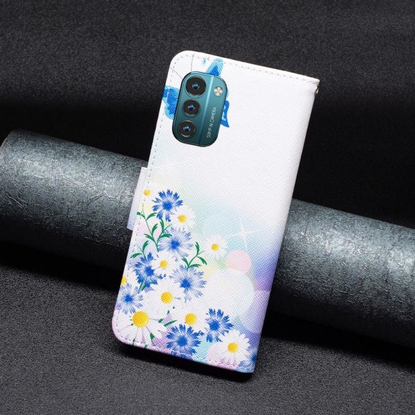Wonderland Nokia G11 / Nokia G21 flip kuoret - Perhonen Ja Kukkia Multicolor