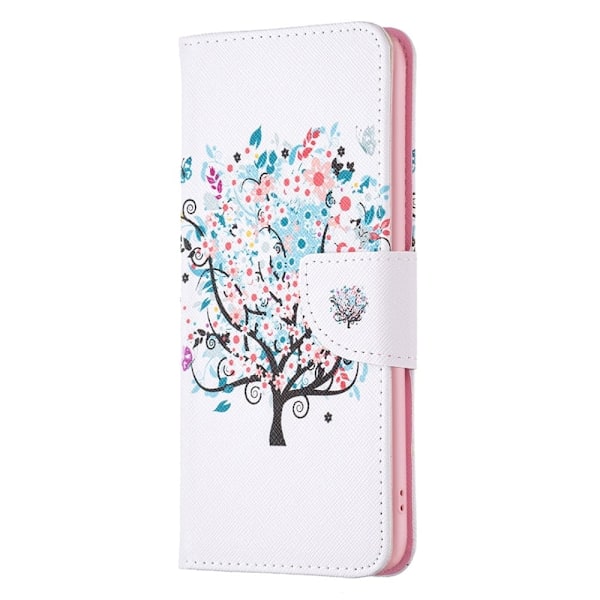 Wonderland Motorola Moto E13 Flip Fodral - Blomma Träd multifärg