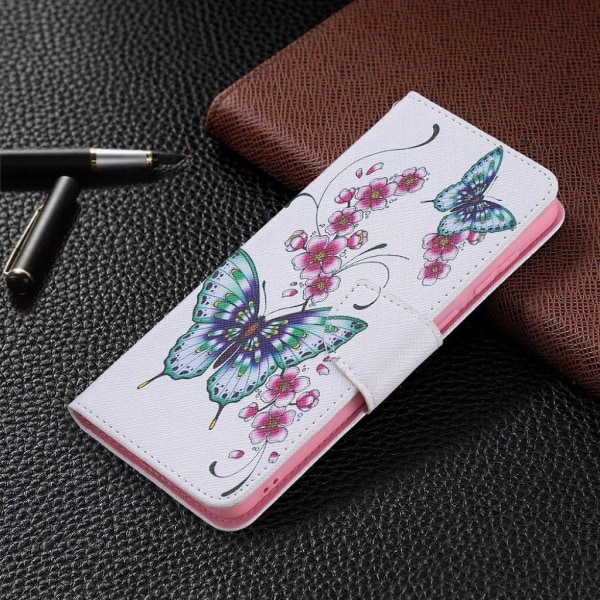 Wonderland Samsung Galaxy A02 flip case - Butterfly and Flowers Multicolor