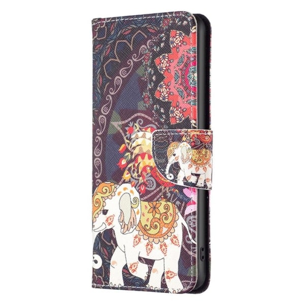 Wonderland iPhone 14 Pro Max flip etui - Blomst Og Elefant Multicolor