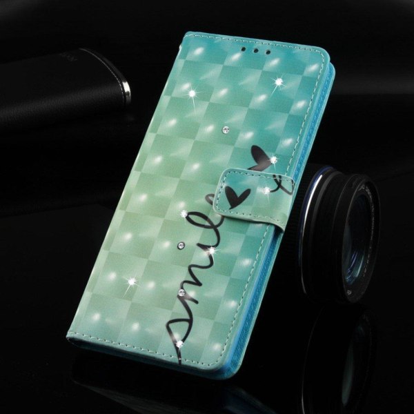 iPhone Xs Max flip cover i læder med rhinstenmønster - Smile Multicolor