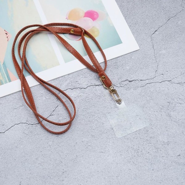 Universal crossbody-nackrem i läder med transparent dyna - Brun Brun