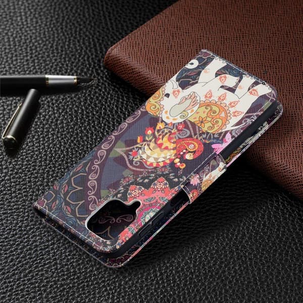 Wonderland Samsung Galaxy A12 5G Flippetui - Malanda og Elefant Multicolor