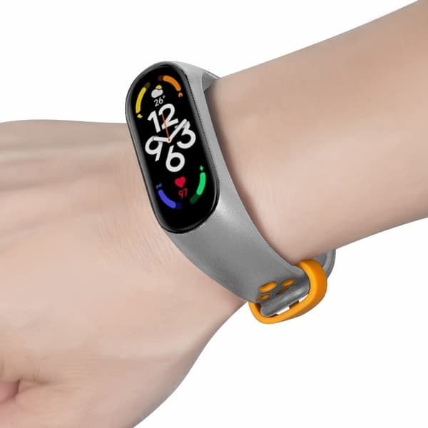 Xiaomi Mi Band 7 / 6 / 5 / 4 / 3 NFC klockarmband Tvåfärgade andningsbara flexibla armband - Grå + Orange Orange