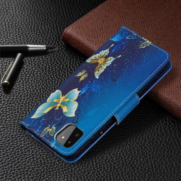 Wonderland Samsung Galaxy A22 5G Flip etui - Golden sommerfugl Blue