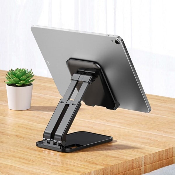 Universal biaxial foldable phone and tablet holder - Black Svart