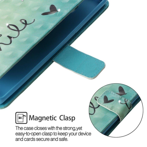 iPhone Xs Max flip cover i læder med rhinstenmønster - Smile Multicolor