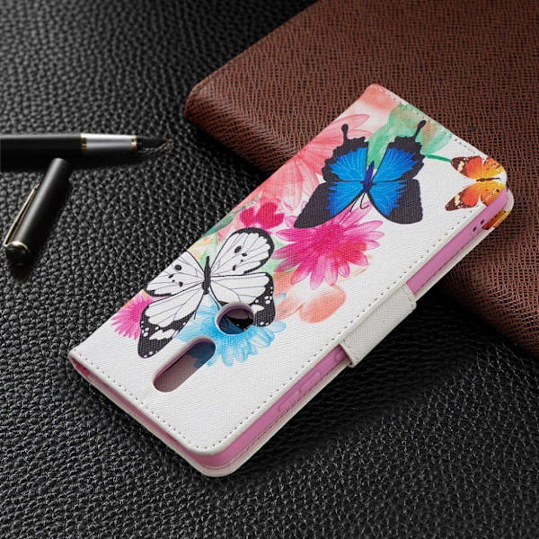 wonderland Nokia 2.4 flip etui - blå sommerfugl Multicolor