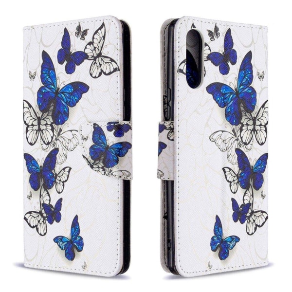 Wonderland Sony Xperia L4 kotelot - Sinivalkoisia perhosia Multicolor
