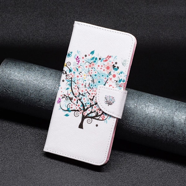 Wonderland Google Pixel 7a Flip Etui - Blomst Træ Multicolor