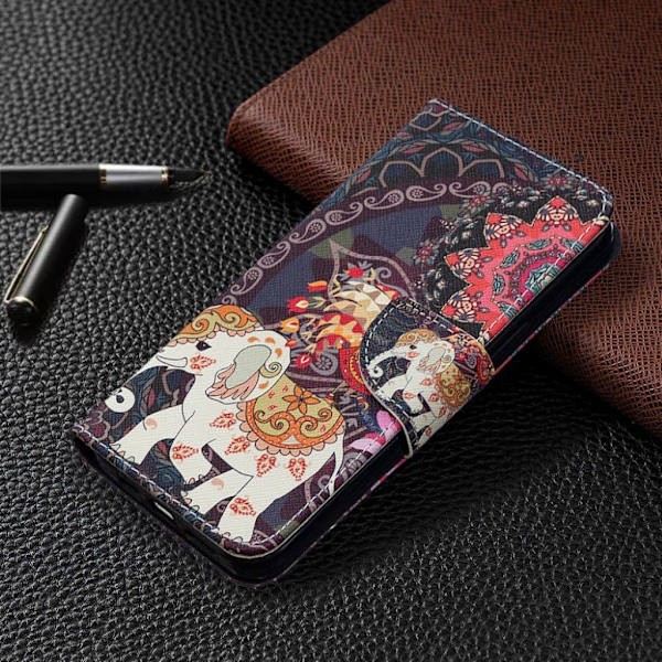 Wonderland iPhone 12 Pro Max flip etui - Ugle Og Træ Multicolor
