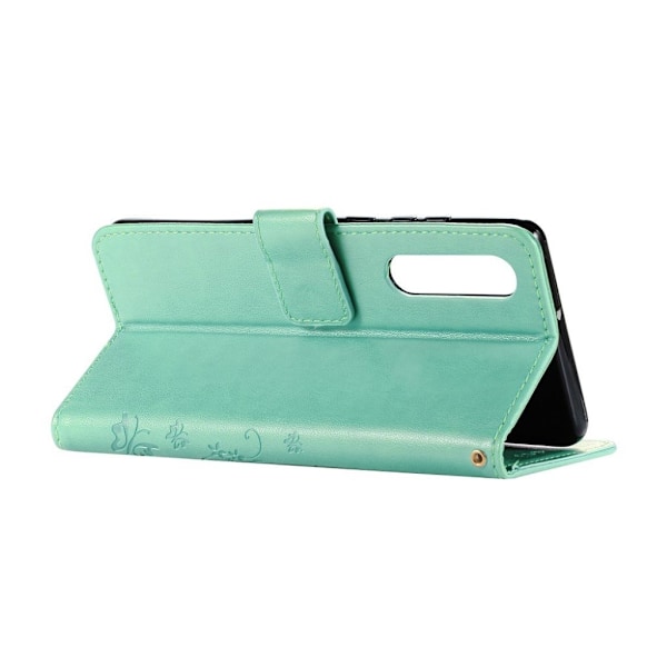 Huawei P30 sommerfugle- og blomstertryk læder flip etui - Cyan Green