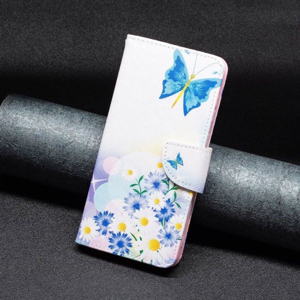 Wonderland Google Pixel 7 Pro flip kuoret - Perhonen Ja Kukkia Multicolor