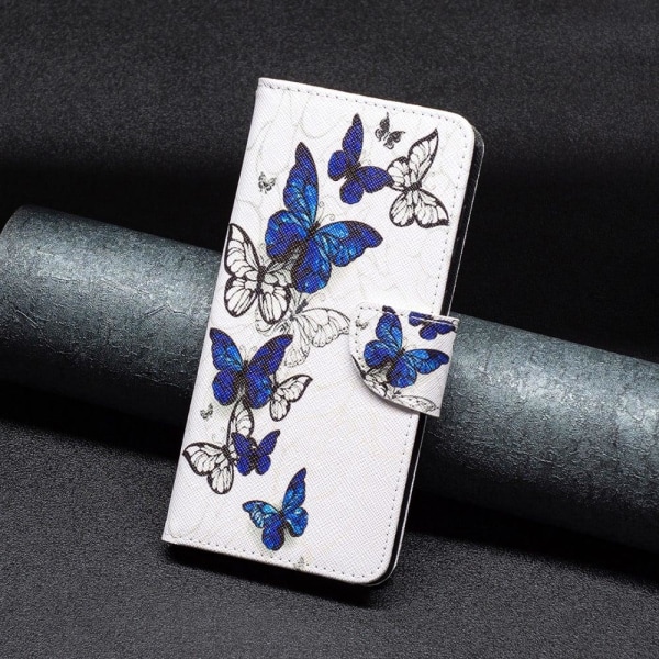 Wonderland Xiaomi Redmi 12C Läppäkotelo - Butterflies Blue