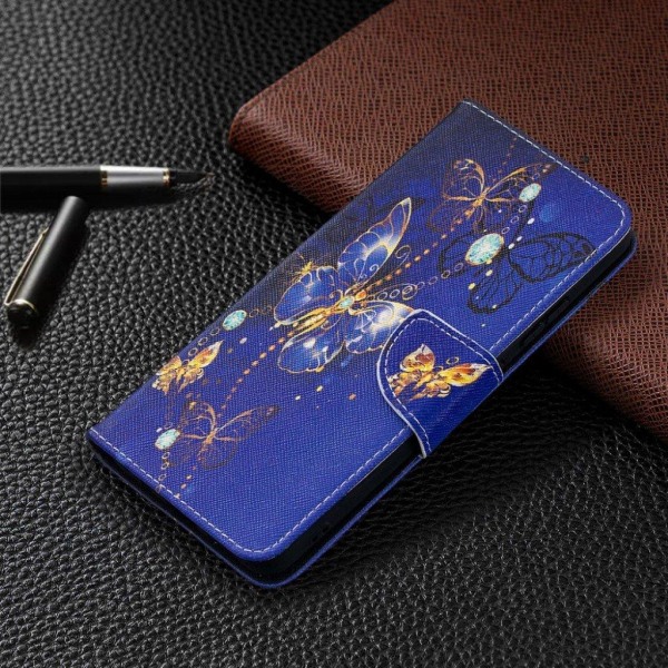 wonderland Nokia 2.4 flip etui - Dark blå sommerfugl Blue