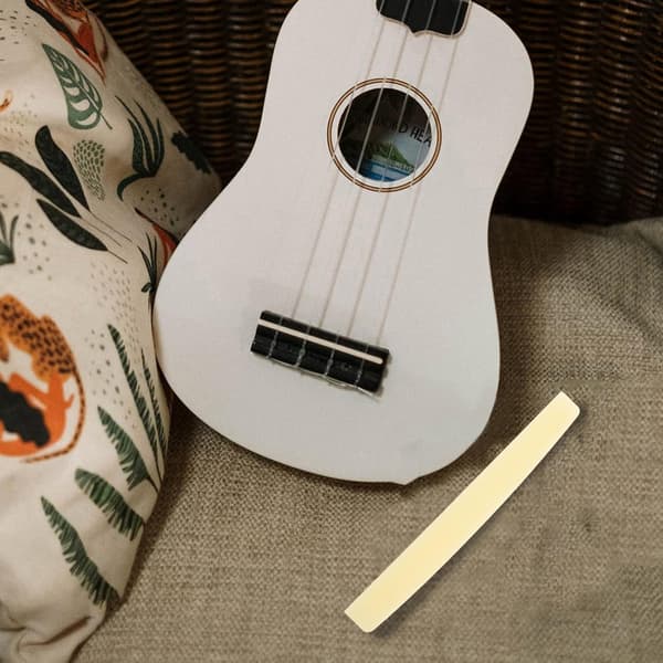 2 uppsättningar gitarrtillbehör Oxben Ersättningsgitarrsadel Övergripande böjda designer och justerbar