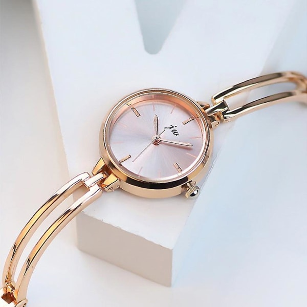 Uusi muodikas yksinkertainen ja tyylikäs naisten watch opiskelijoille Elektroninen watch Gold strap white plate