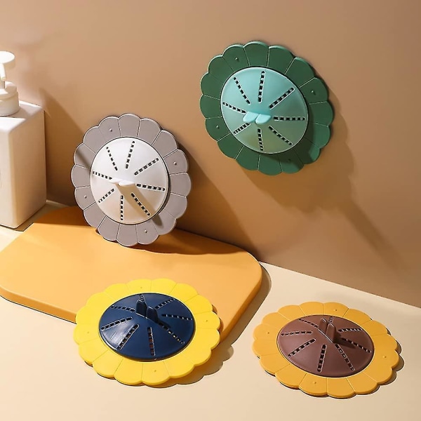 Solsikkeformet roterbar silikonhårfanger med sugekopper og håndtak, dusjavløpshårstopper, avløpssildeksel, avløpsfilter, for vask