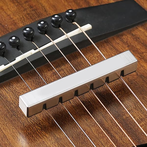 Gitarrdämpare i aluminiumlegering för brusreducering och volymkontroll vid övning