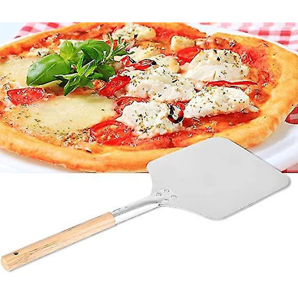 Alumiininen pizzalauta leipuriuunin lusikka puukahvalla