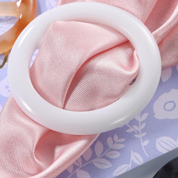 40 st runda hartsspännen med 2,5 cm och 3 cm innerdiameter