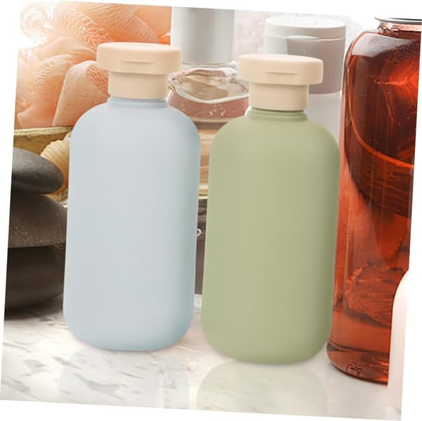 2 st resevätskebehållare påfyllningsbara schampo- och lotionflaskor 300 ml