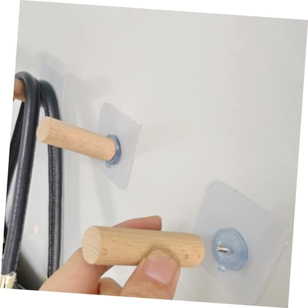 6 kpl itseliimautuvia puuseinäkoukkuja 2x5cm pyökki, rei'ittämätön, raskas takki