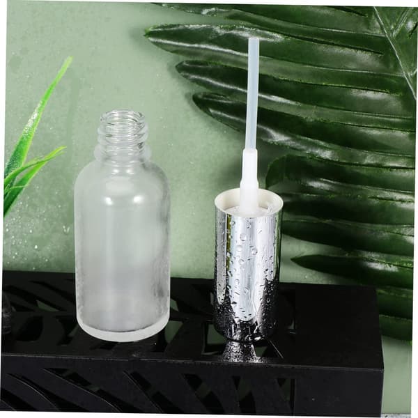 9st matta polerade glasflaskor pump för eterisk olja parfym underförpackning