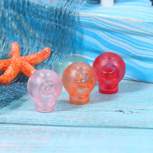 Justerbart plastsnørlåssett, assorterte farger, 50 stk, resirkulerbart materiale, rund vippe, tilfeldig farge