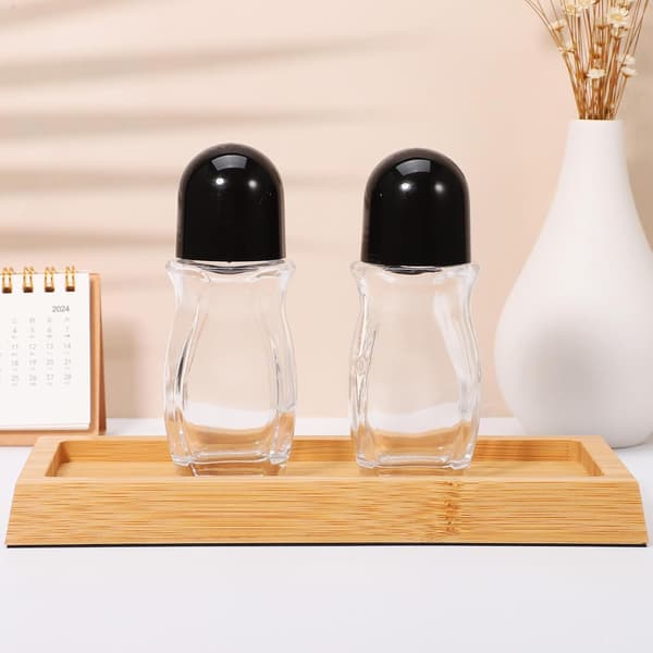 Glasflaskor med rullkula 2 st 50 ml påfyllningsbara resebehållare för parfym och eteriska oljor