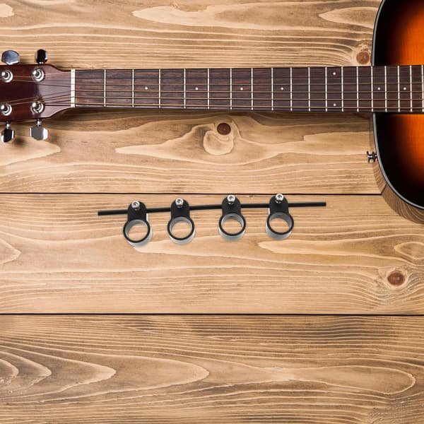 Fingerutvider for gitar og bass med elastisk koblingsstang, ABS- og silikonmateriale
