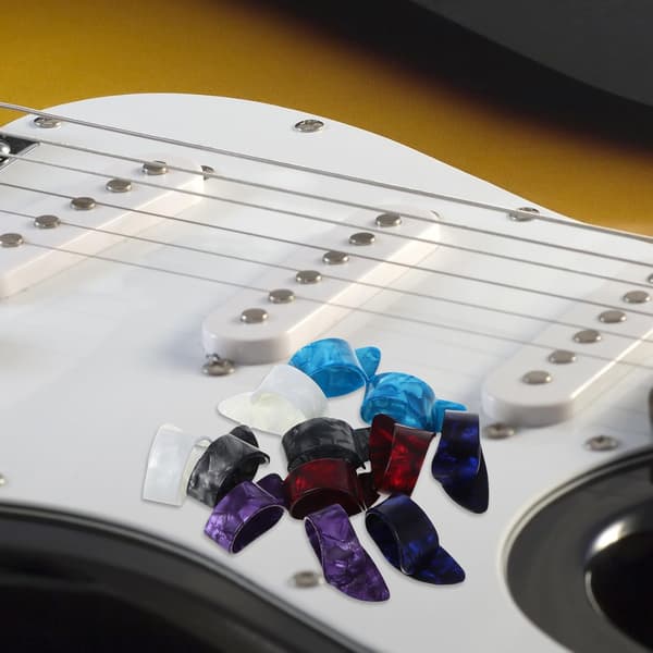 12 st gitarrtumplektrum och fingerplektrum för akustisk gitarr, banjo, ukulele och harpa