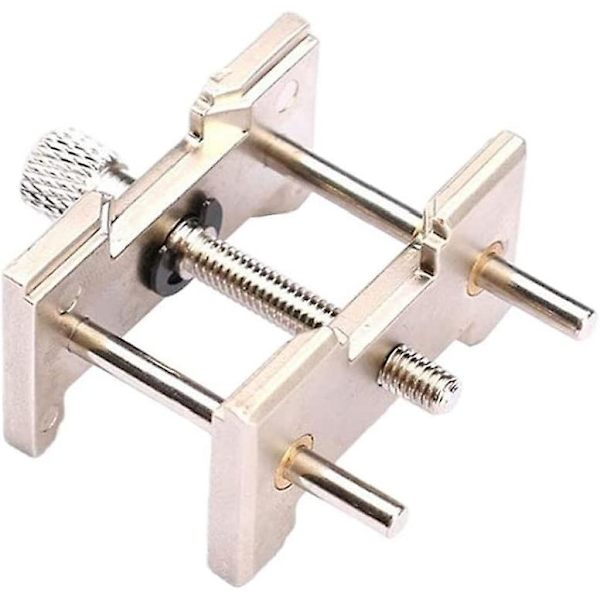 Kelloliikkeen pidikesetti 2-in-1 käännettävä metallikellotehtaan puristimen korjaustyökalu 2 kpl teollisuusvälineitä