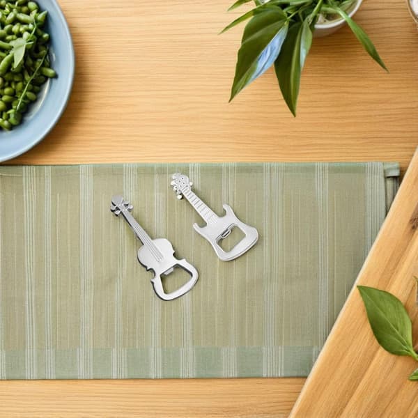 4 stk. flaskeåpnere i sølv sinklegering med fiolin- og gitardesign