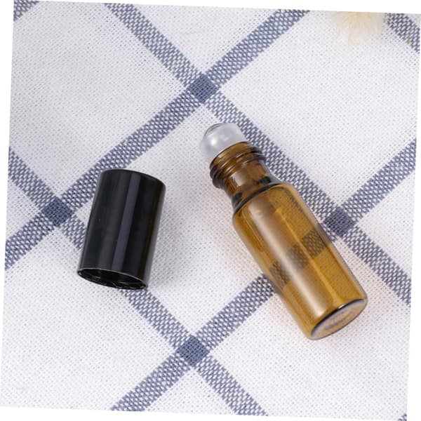 24 st. glassprayflaskor och roll-on-flaskor för eteriska oljor, metallkulor och roll-on