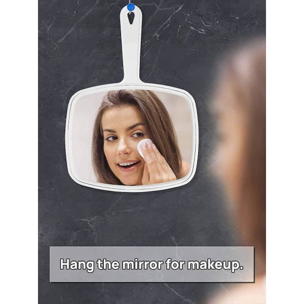 Håndholdt speil med håndtak