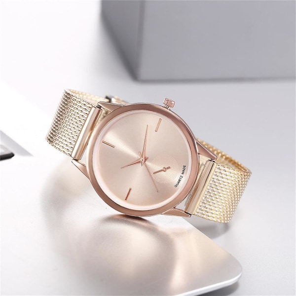 Damklocka i elegant och kreativ plastnät med kvartsurverk Gold-faced gold shell gold strap