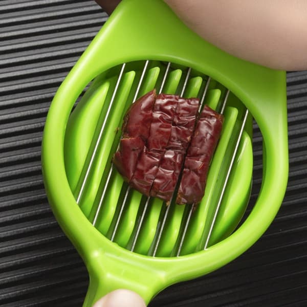 2 stk. multifunksjonelle fruktskjæreverktøy laget av rustfritt stål og plast