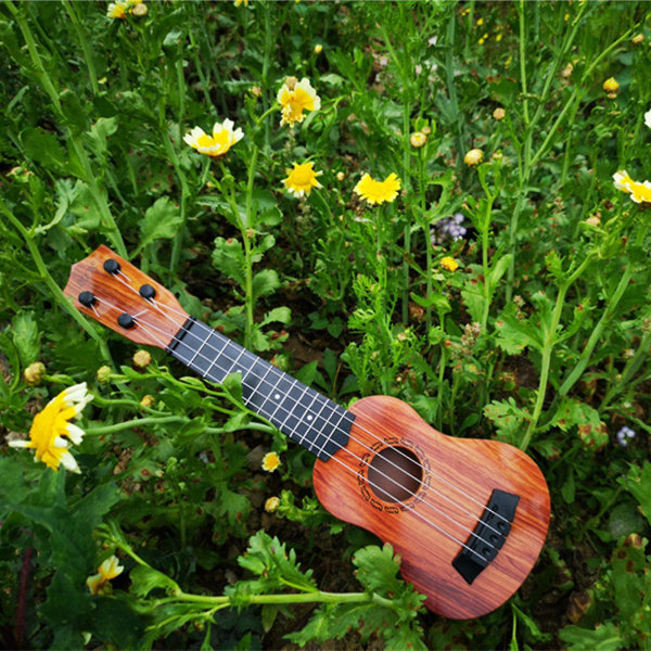 Barnegitar Ukulele Nybegynnermusikkinstrument 15 tommer med 4 strenger minigitar for ferdigheter Forbedring av barn leker tidlig pedagogisk førskolebarn