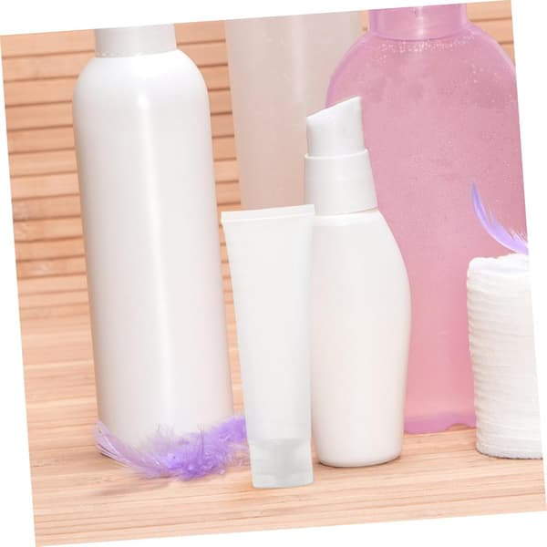 Resetoalettbehållare 4st 100ml Plast Påfyllningsbara Klämflaskor