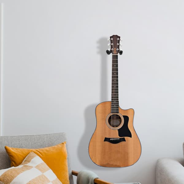 Gitarrväggfäste med metallkonstruktion och svampvaddering
