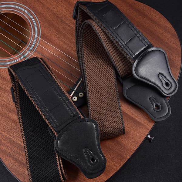 Praktisk svart bomullsrem för ukulele och gitarr med anti-stretch-funktion