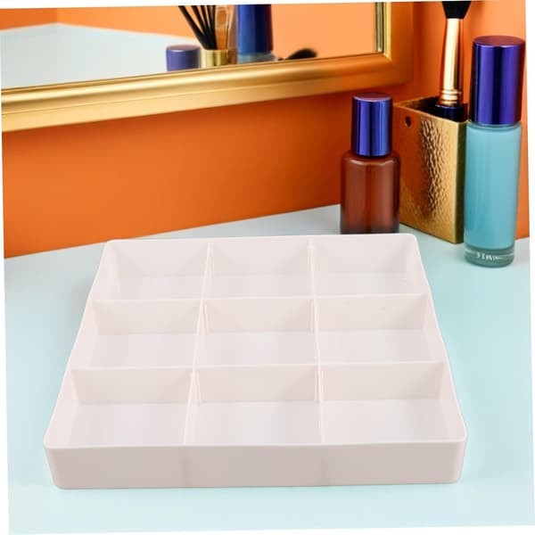 Justerbar makeup-skuffeorganisatorbakke med ruminddeling