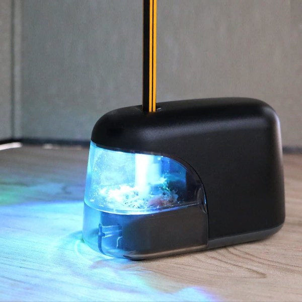 Sähköinen lyijykynien teroitin LED-valolla hehkuu kyniä teroitaessa (musta)