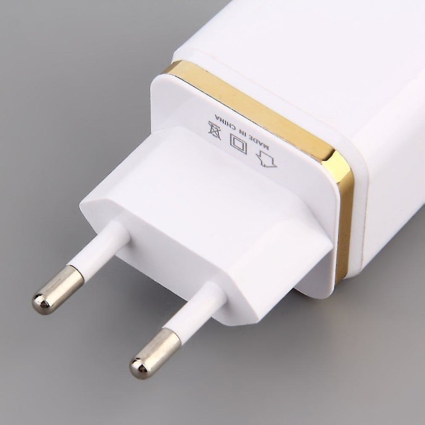 Universal 4-ports USB Reisevegglader EU-pluggadapter